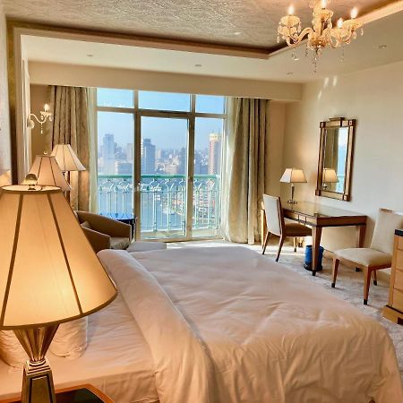 Chez Haytham At Four Seasons Nile Plaza Residential Suite Kairo Bagian luar foto