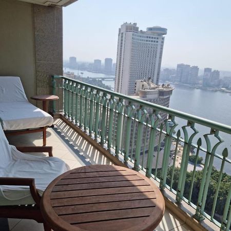 Chez Haytham At Four Seasons Nile Plaza Residential Suite Kairo Bagian luar foto