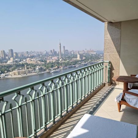 Chez Haytham At Four Seasons Nile Plaza Residential Suite Kairo Bagian luar foto