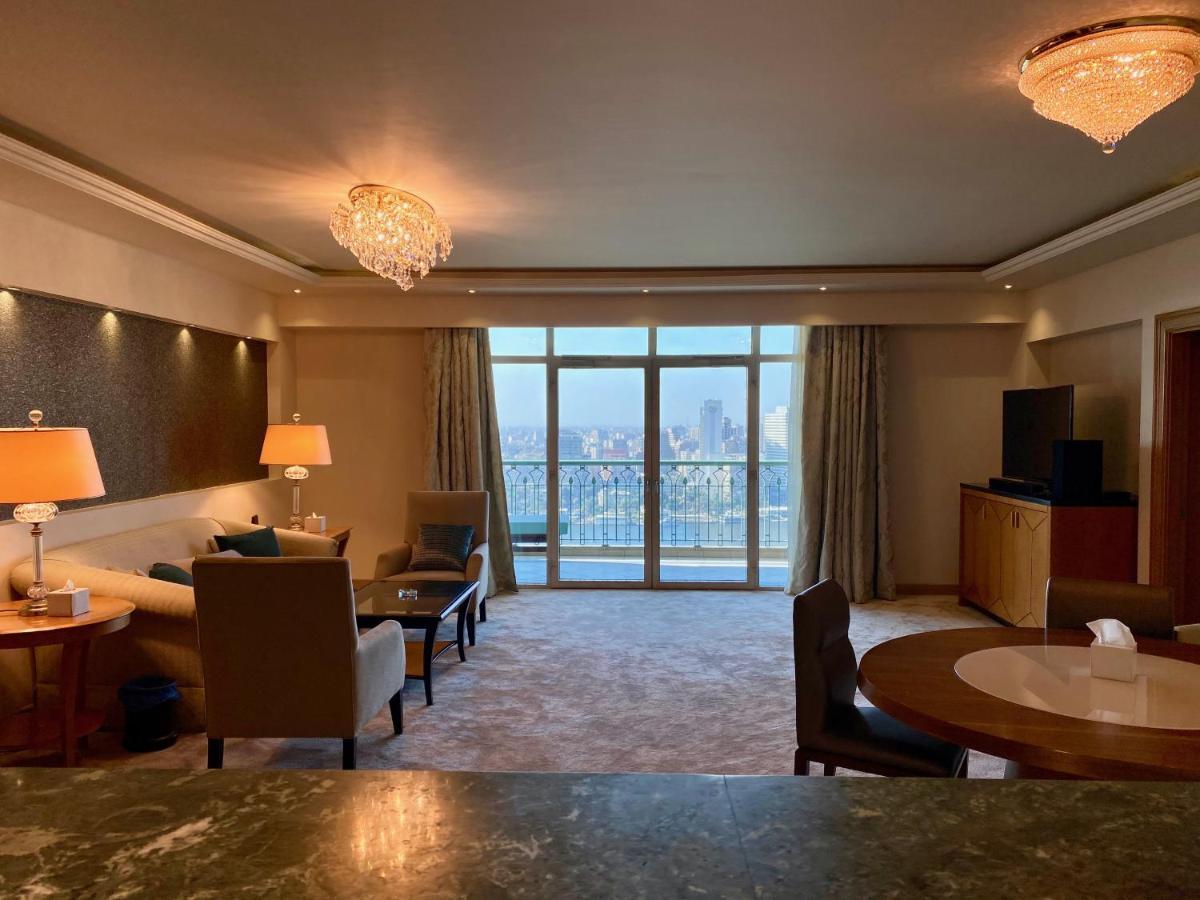 Chez Haytham At Four Seasons Nile Plaza Residential Suite Kairo Bagian luar foto