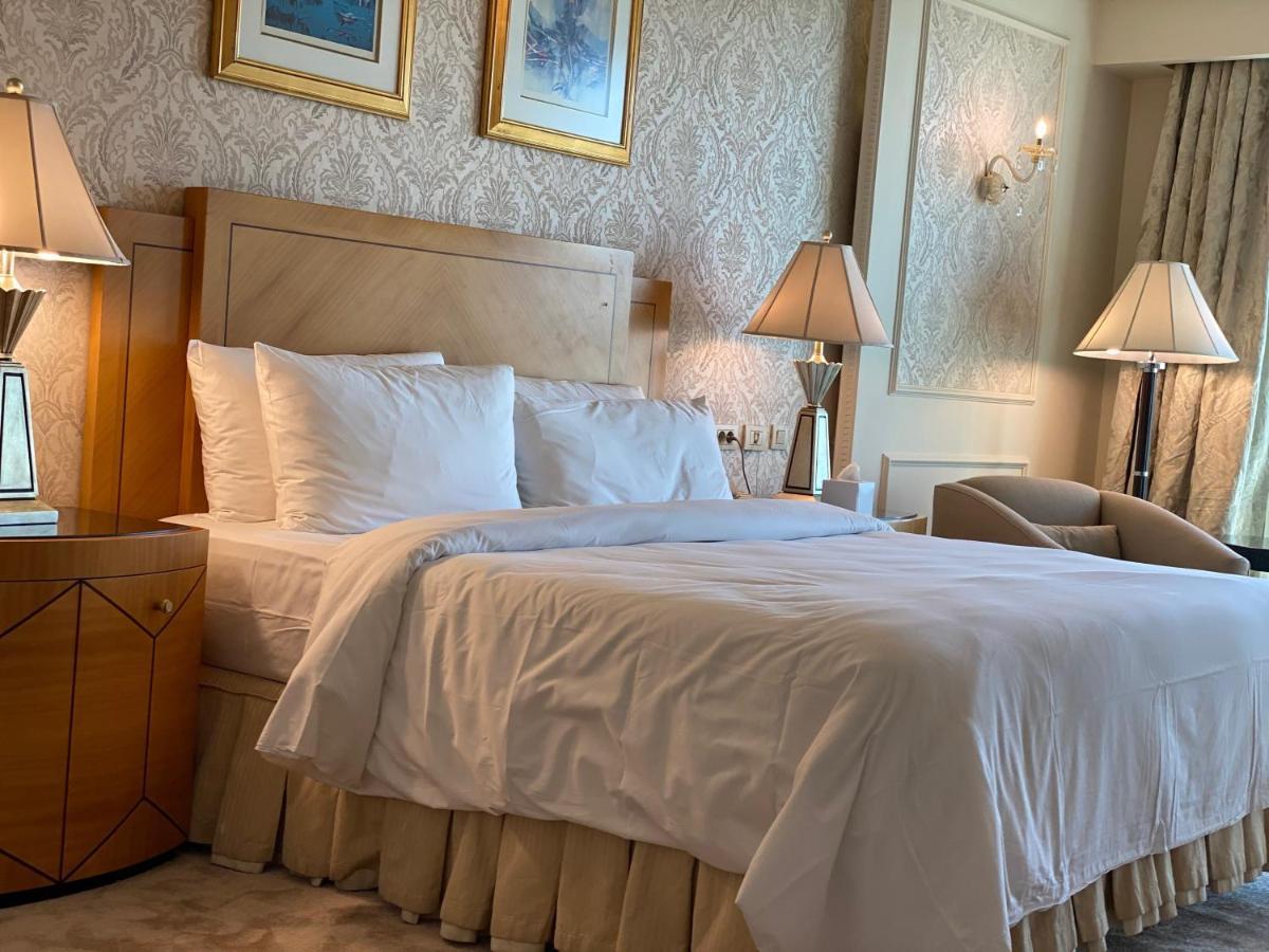 Chez Haytham At Four Seasons Nile Plaza Residential Suite Kairo Bagian luar foto