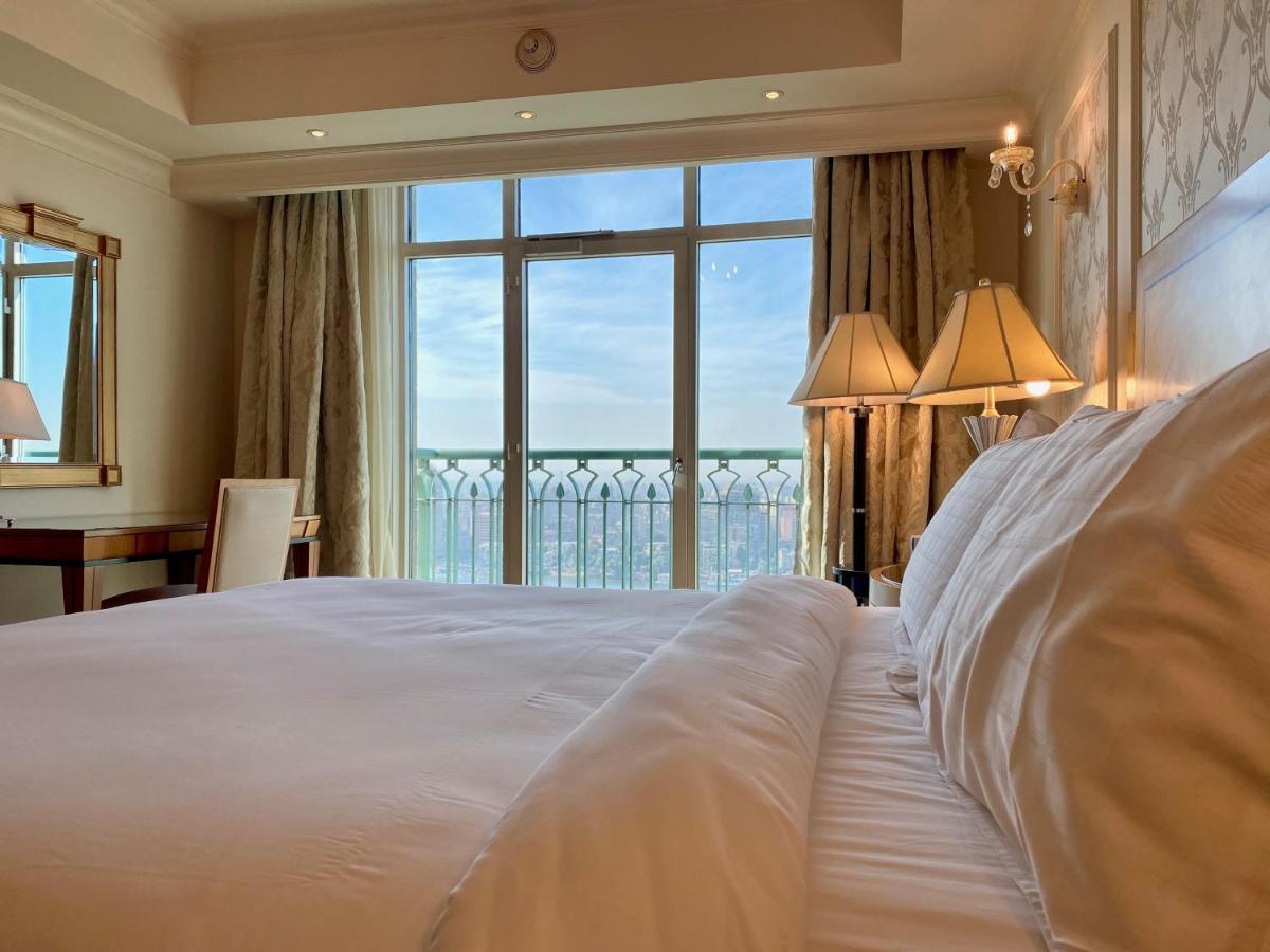 Chez Haytham At Four Seasons Nile Plaza Residential Suite Kairo Bagian luar foto