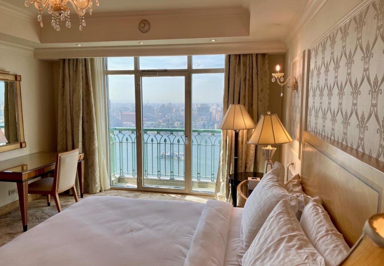 Chez Haytham At Four Seasons Nile Plaza Residential Suite Kairo Bagian luar foto