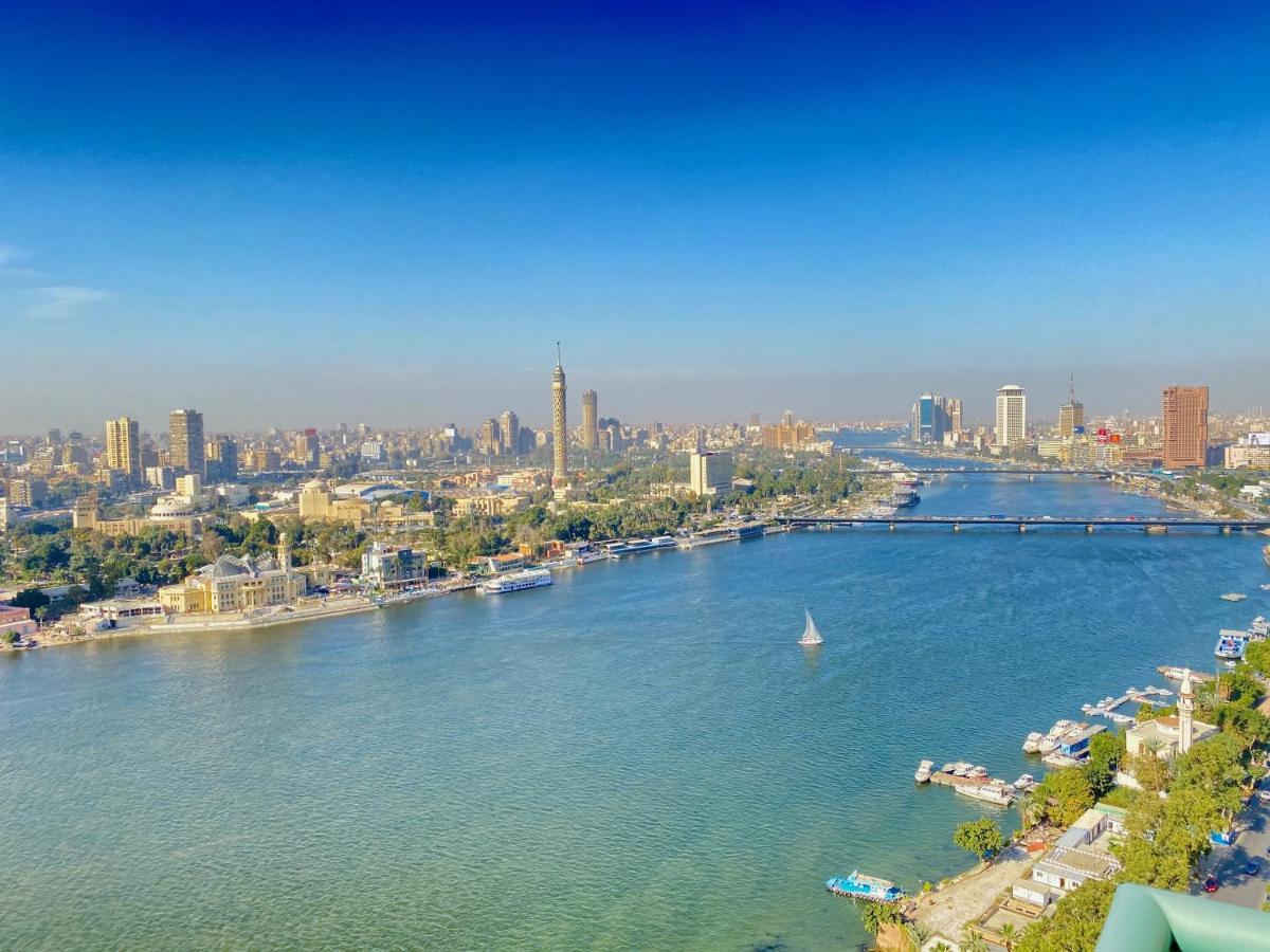 Chez Haytham At Four Seasons Nile Plaza Residential Suite Kairo Bagian luar foto