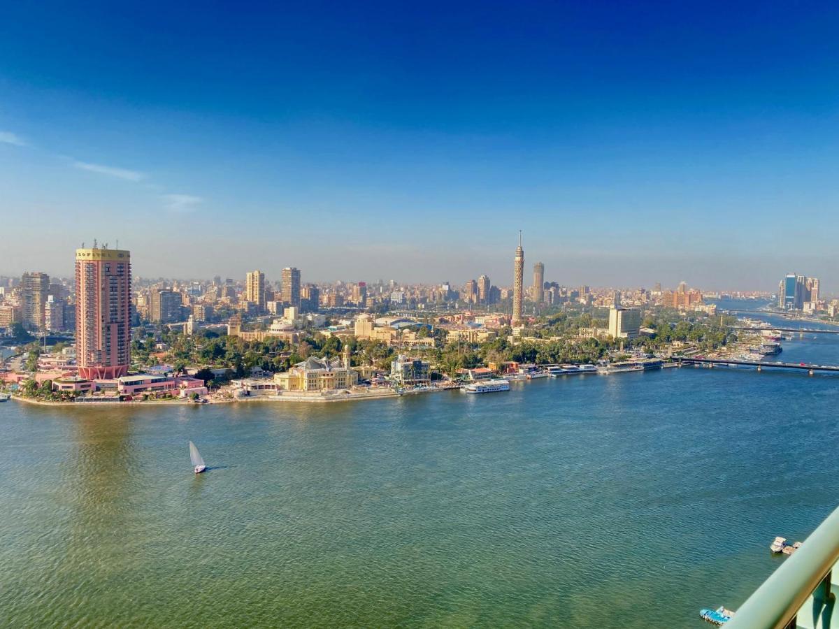 Chez Haytham At Four Seasons Nile Plaza Residential Suite Kairo Bagian luar foto