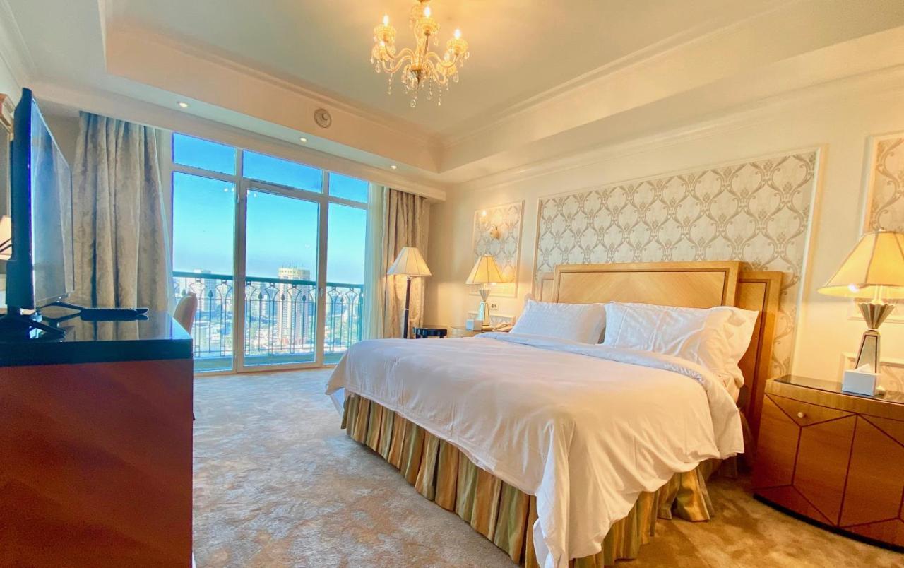 Chez Haytham At Four Seasons Nile Plaza Residential Suite Kairo Bagian luar foto