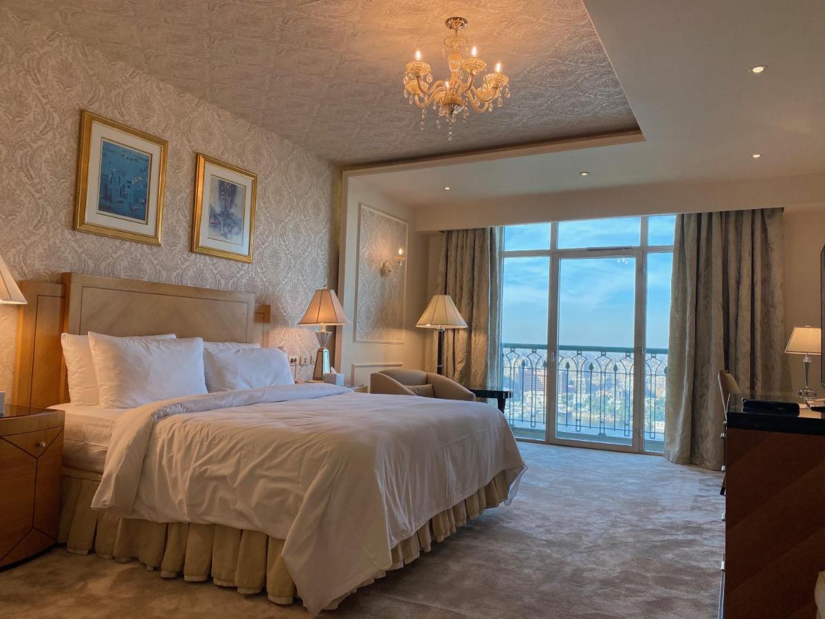 Chez Haytham At Four Seasons Nile Plaza Residential Suite Kairo Bagian luar foto