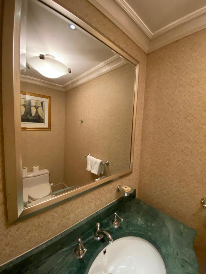 Chez Haytham At Four Seasons Nile Plaza Residential Suite Kairo Bagian luar foto