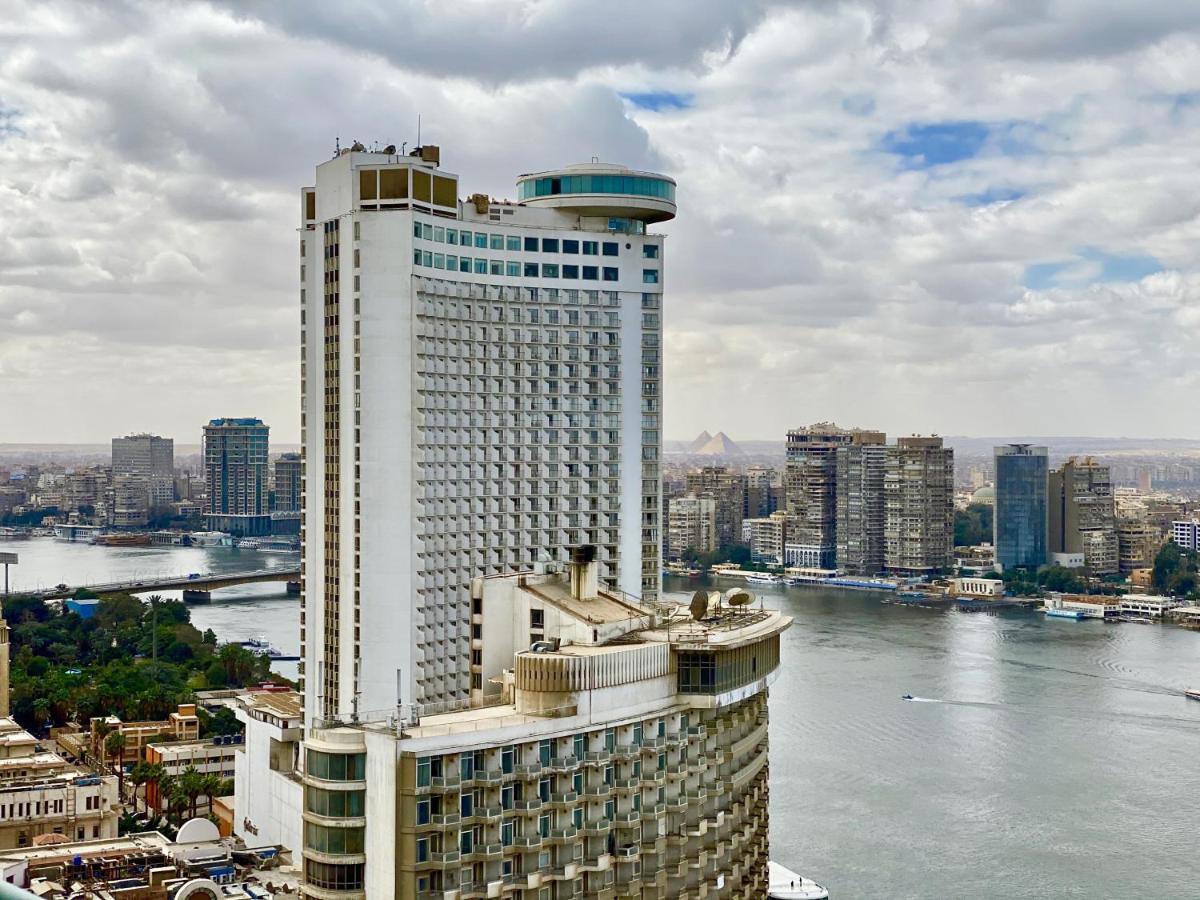 Chez Haytham At Four Seasons Nile Plaza Residential Suite Kairo Bagian luar foto