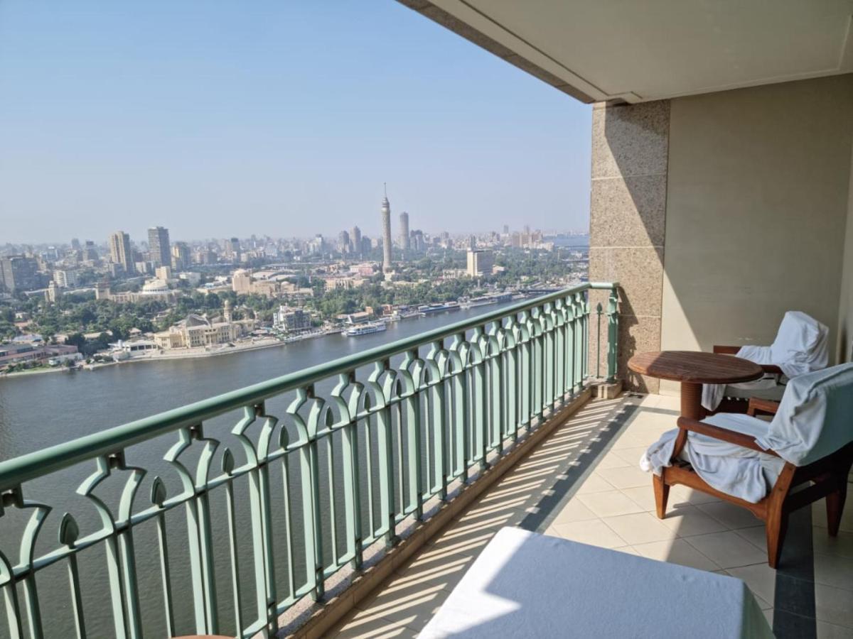 Chez Haytham At Four Seasons Nile Plaza Residential Suite Kairo Bagian luar foto